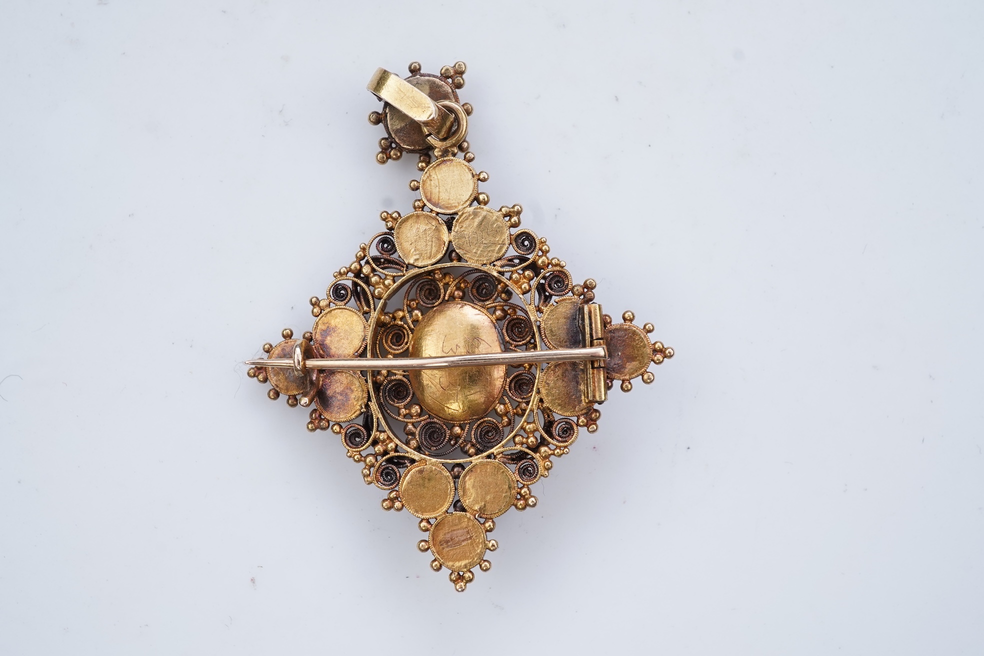 A late Georgian garnet pendant/brooch, 1830s